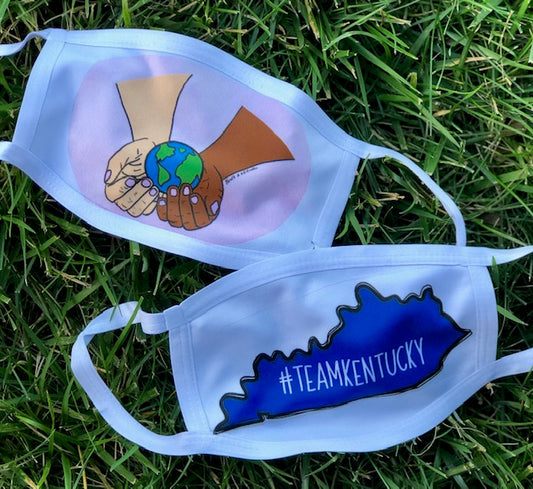 Never a Dull Creation Hands holding the World